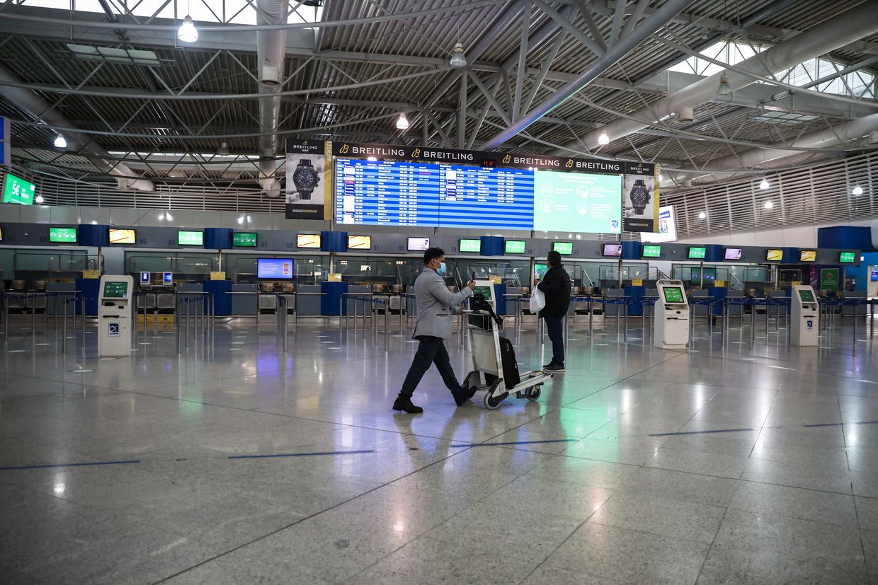 Αεροδρόμιο, ταξιδιώτες με αποσκευές
