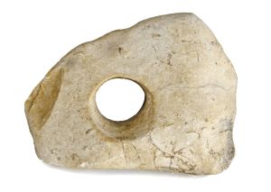 Ancient stone axe with hole found at Israel