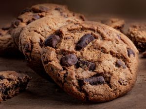 Chocolate chip cookies on wooden Background, copyspace, top view